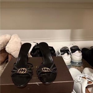 Gucci Black Heels with Gold Emblem